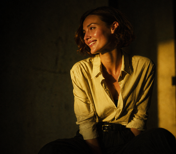 business_women_gently_smiling_and_looking_away_small